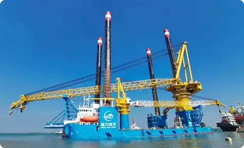 How does the hook parking device prevent overtopping on luffing cranes?